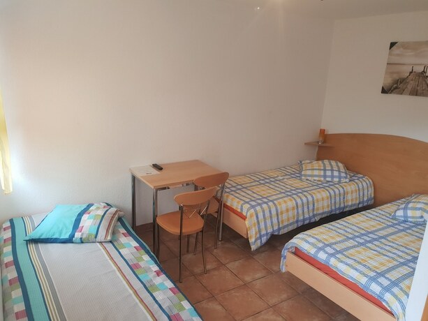 Imagen de la habitación del Hotel G&icirc;te - dortoir La Cigale. Foto 18