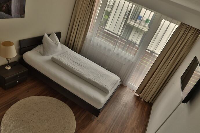 Imagen de la habitación del Hotel Giessen and Coffeehouse. Foto 17