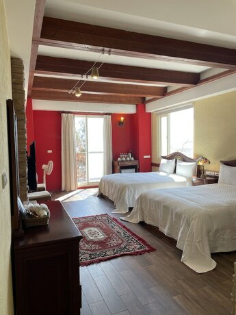 Imagen de la habitación del Hotel Giethoorn CingJing. Foto 16