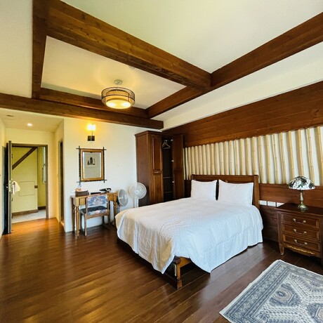 Imagen de la habitación del Hotel Giethoorn CingJing. Foto 17