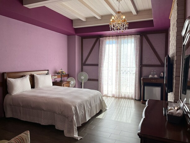 Imagen de la habitación del Hotel Giethoorn CingJing. Foto 18