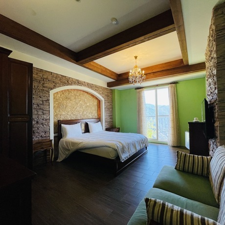 Imagen de la habitación del Hotel Giethoorn CingJing. Foto 19