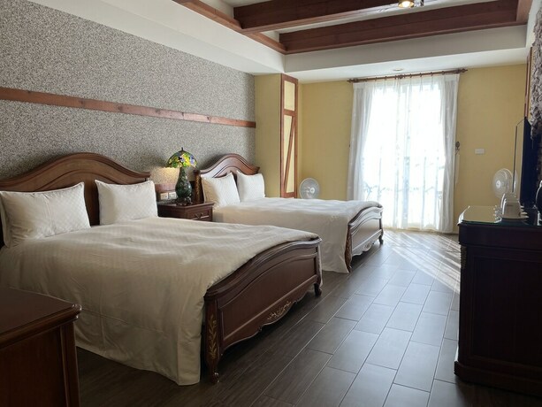 Imagen de la habitación del Hotel Giethoorn CingJing. Foto 20