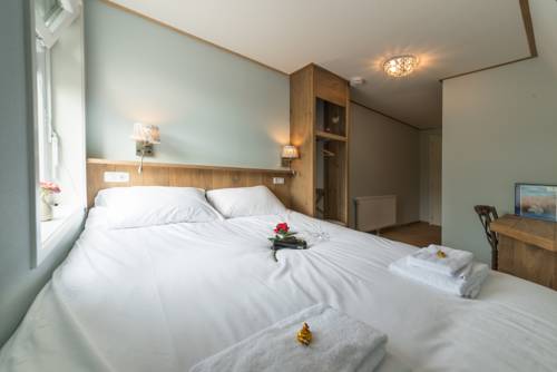 Imagen de la habitación del Hotel Giethoorn. Foto 6