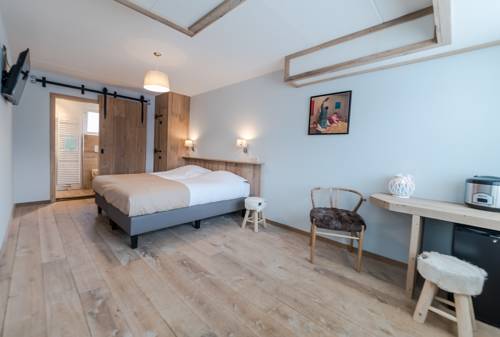 Imagen de la habitación del Hotel Giethoorn. Foto 10