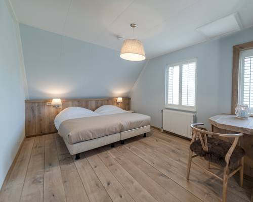 Imagen de la habitación del Hotel Giethoorn. Foto 14