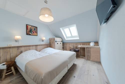 Imagen de la habitación del Hotel Giethoorn. Foto 16