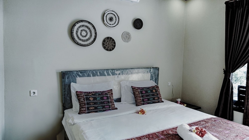 Imagen de la habitación del Hotel Gihon Bungalow. Foto 2