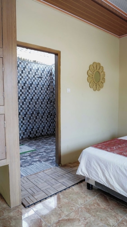 Imagen de la habitación del Hotel Gihon Bungalow. Foto 9