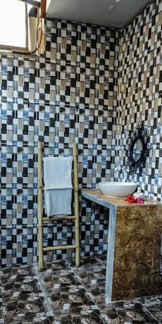 Imagen de la habitación del Hotel Gihon Bungalow. Foto 10