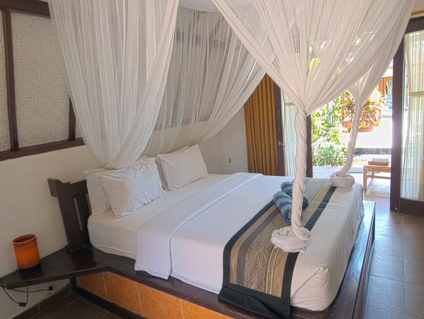 Imagen de la habitación del Hotel Gili Air Bungalows. Foto 8