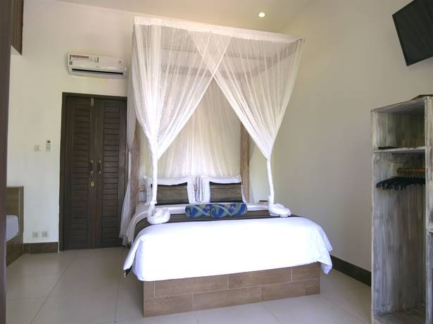 Imagen de la habitación del Hotel Gili Air Bungalows. Foto 9