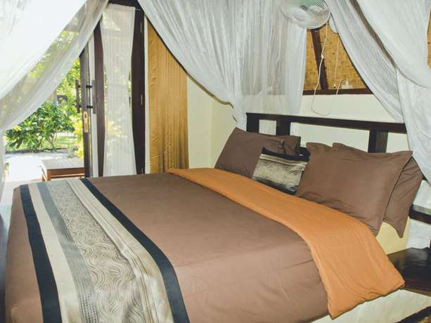 Imagen de la habitación del Hotel Gili Air Bungalows. Foto 10