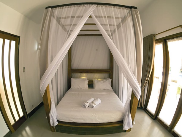 Imagen de la habitación del Hotel Gili Air Bungalows. Foto 11