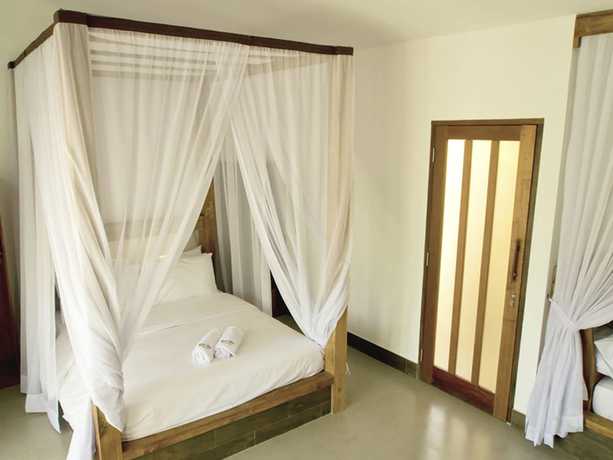 Imagen de la habitación del Hotel Gili Air Bungalows. Foto 12