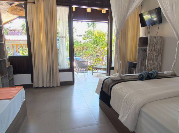 Imagen de la habitación del Hotel Gili Air Bungalows. Foto 16