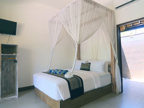 Imagen de la habitación del Hotel Gili Air Bungalows. Foto 17