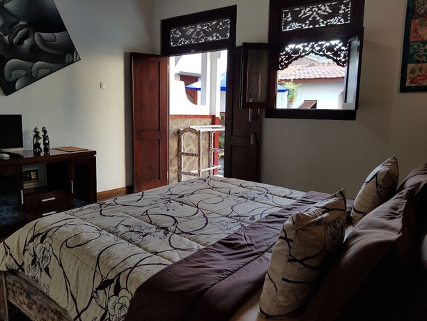 Imagen de la habitación del Hotel Gili Bagaz Cottages. Foto 4