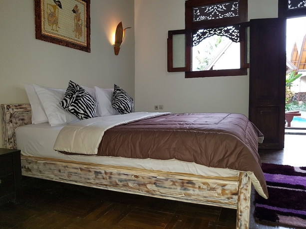 Imagen de la habitación del Hotel Gili Bagaz Cottages. Foto 5