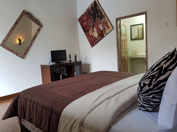 Imagen de la habitación del Hotel Gili Bagaz Cottages. Foto 9
