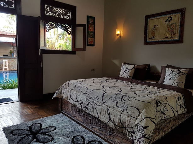 Imagen de la habitación del Hotel Gili Bagaz Cottages. Foto 10
