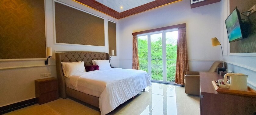 Imagen de la habitación del Hotel Gili Beachfront Suites. Foto 13