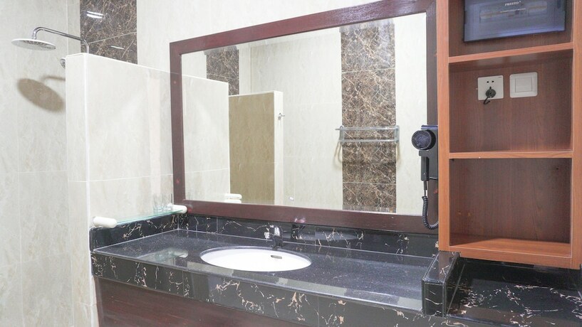 Imagen de la habitación del Hotel Gili Beachfront Suites. Foto 15