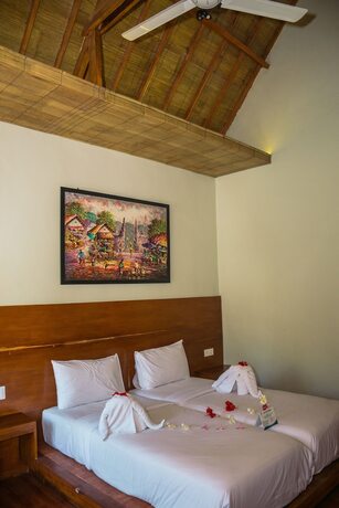Imagen de la habitación del Hotel Gili One and Resort. Foto 19