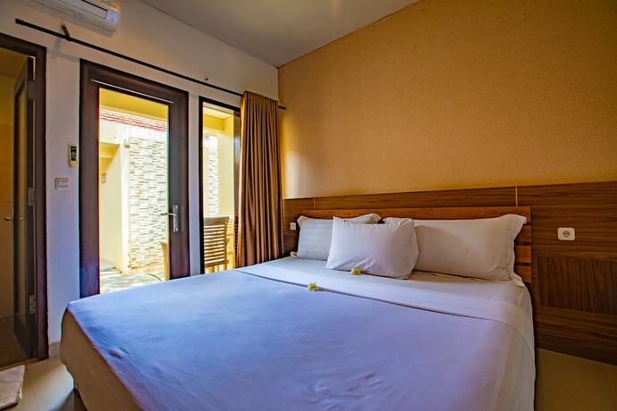 Imagen de la habitación del Hotel Gili Sands And Bar. Foto 19