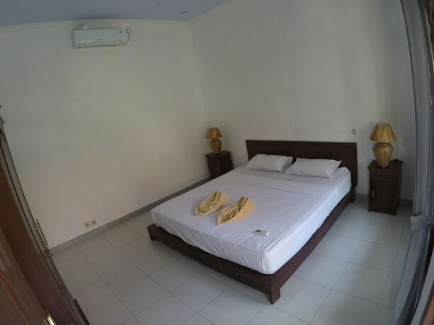 Imagen de la habitación del Hotel Gili Smile Bungalows. Foto 16