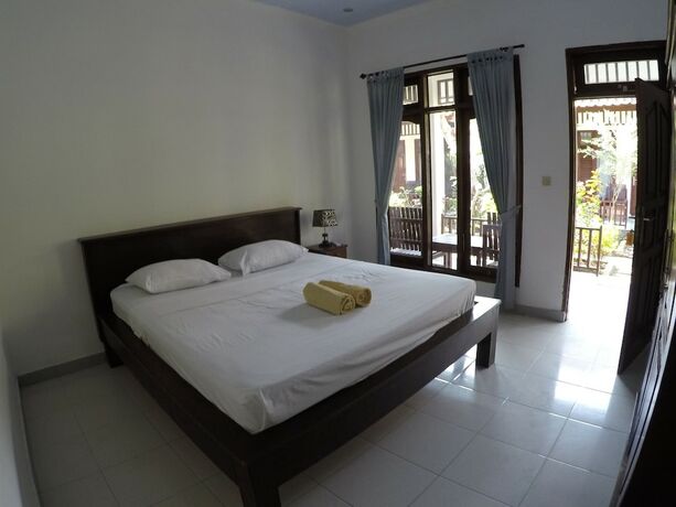 Imagen de la habitación del Hotel Gili Smile Bungalows. Foto 17