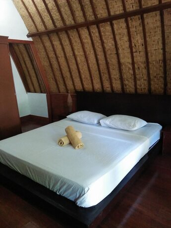 Imagen de la habitación del Hotel Gili Smile Bungalows. Foto 18