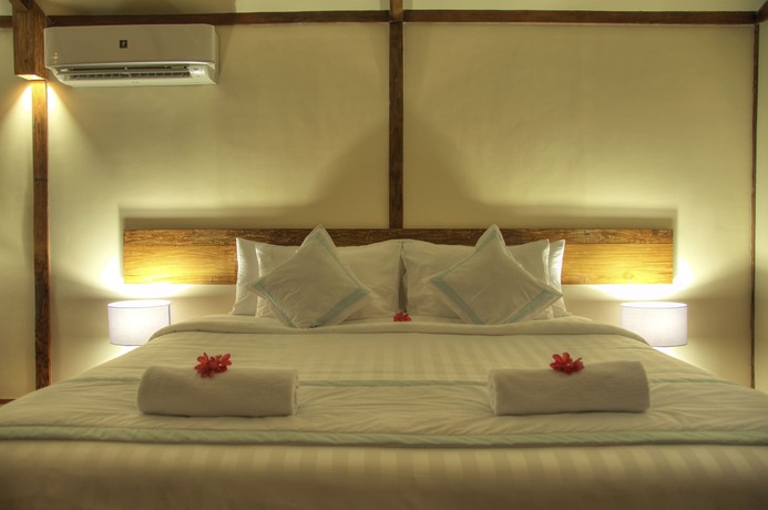 Imagen de la habitación del Hotel Gili Teak Resort. Foto 13