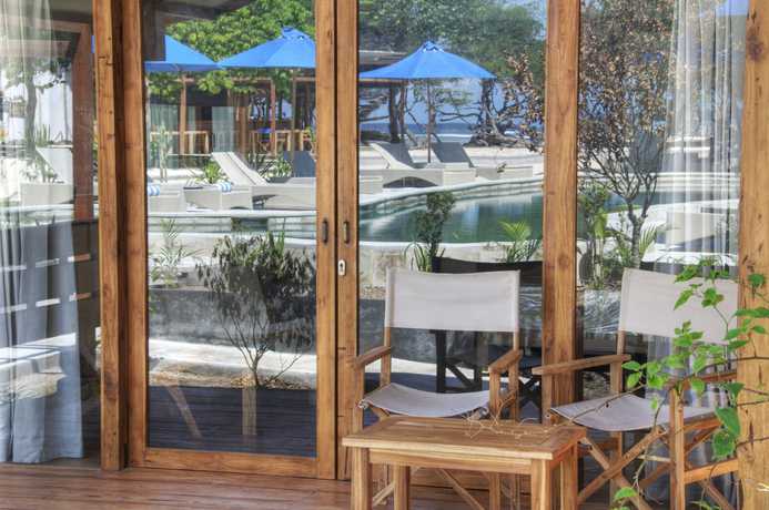 Imagen de la habitación del Hotel Gili Teak Resort. Foto 14