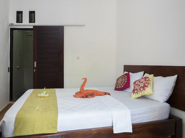 Imagen de la habitación del Hotel Gili Turtle Beach Resort. Foto 16