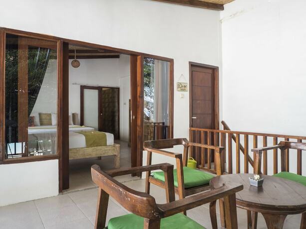 Imagen de la habitación del Hotel Gili Turtle Beach Resort. Foto 17