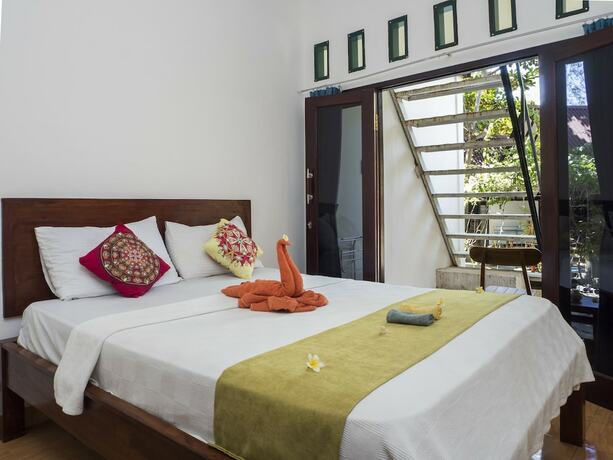 Imagen de la habitación del Hotel Gili Turtle Beach Resort. Foto 18