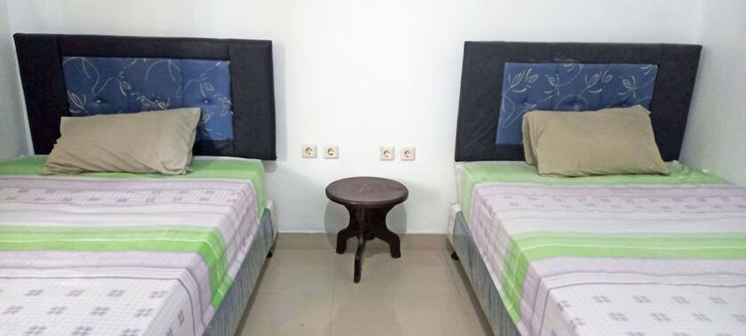 Imagen de la habitación del Hotel Gili Welldone Guesthouse. Foto 13