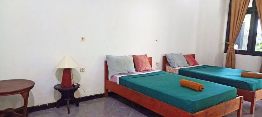Imagen de la habitación del Hotel Gili Welldone Guesthouse. Foto 16