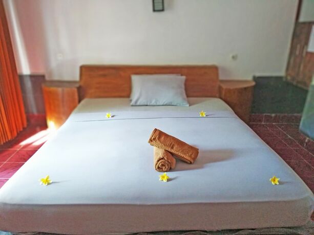 Imagen de la habitación del Hotel Gili Welldone Guesthouse. Foto 17