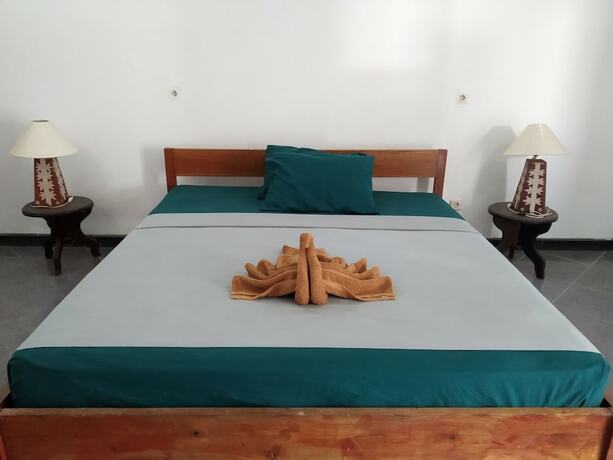 Imagen de la habitación del Hotel Gili Welldone Guesthouse. Foto 18