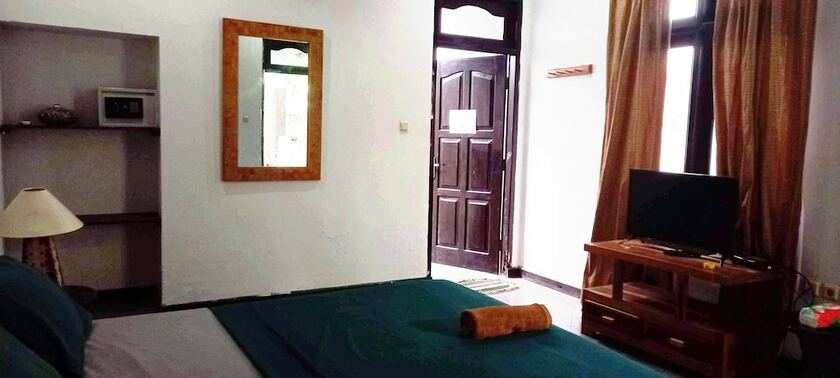Imagen de la habitación del Hotel Gili Welldone Guesthouse. Foto 19