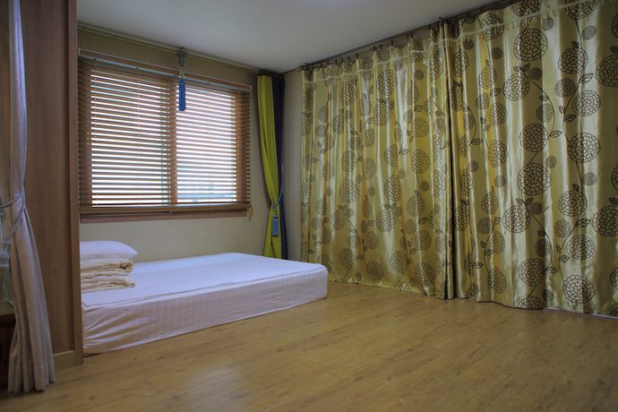 Imagen de la habitación del Hotel Gillime Pension. Foto 18