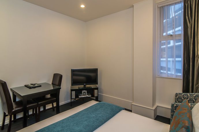 Imagen de la habitación del Hotel Gilmer Apartment. Foto 8