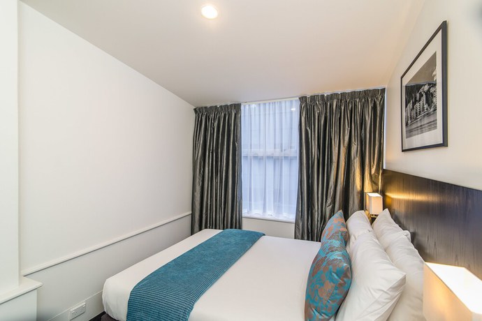 Imagen de la habitación del Hotel Gilmer Apartment. Foto 15