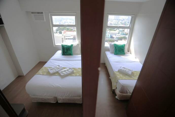 Imagen de la habitación del Hotel Gilmore Tower Suites By Sms Hospitality. Foto 19