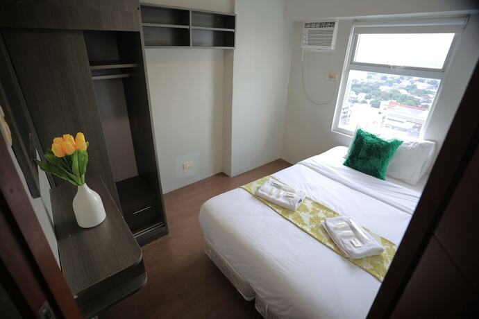 Imagen de la habitación del Hotel Gilmore Tower Suites By Sms Hospitality. Foto 20