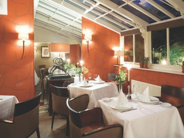 Imagen del bar/restaurante del Hotel Gilpin Lodge Country House. Foto 3