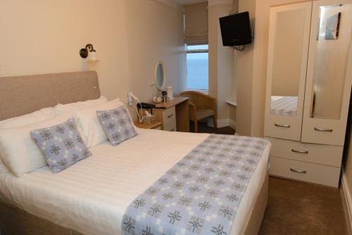 Imagen de la habitación del Hotel Giltar. Foto 10