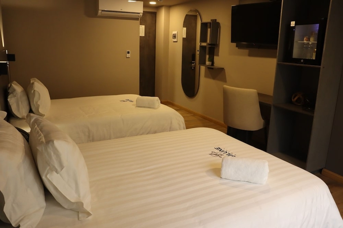 Imagen de la habitación del Hotel Giluxe, AMCO, Area Metropolitana Centro Occidente. Foto 17